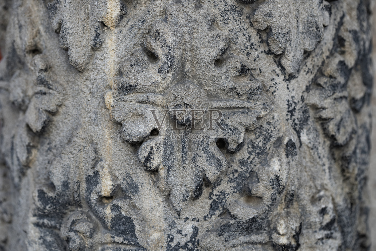 带有花卉图案的古代石雕照片摄影图片