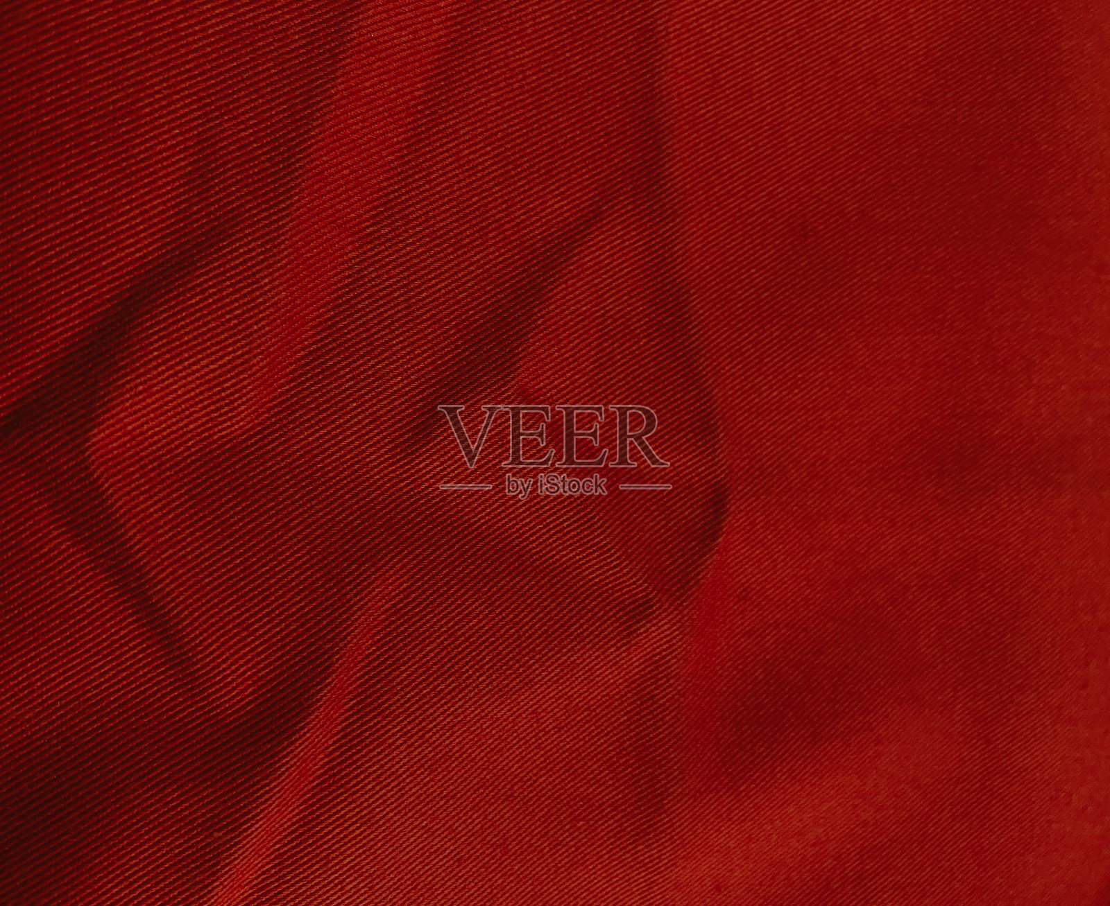 俯视角度的褶皱红色布料背景照片摄影图片