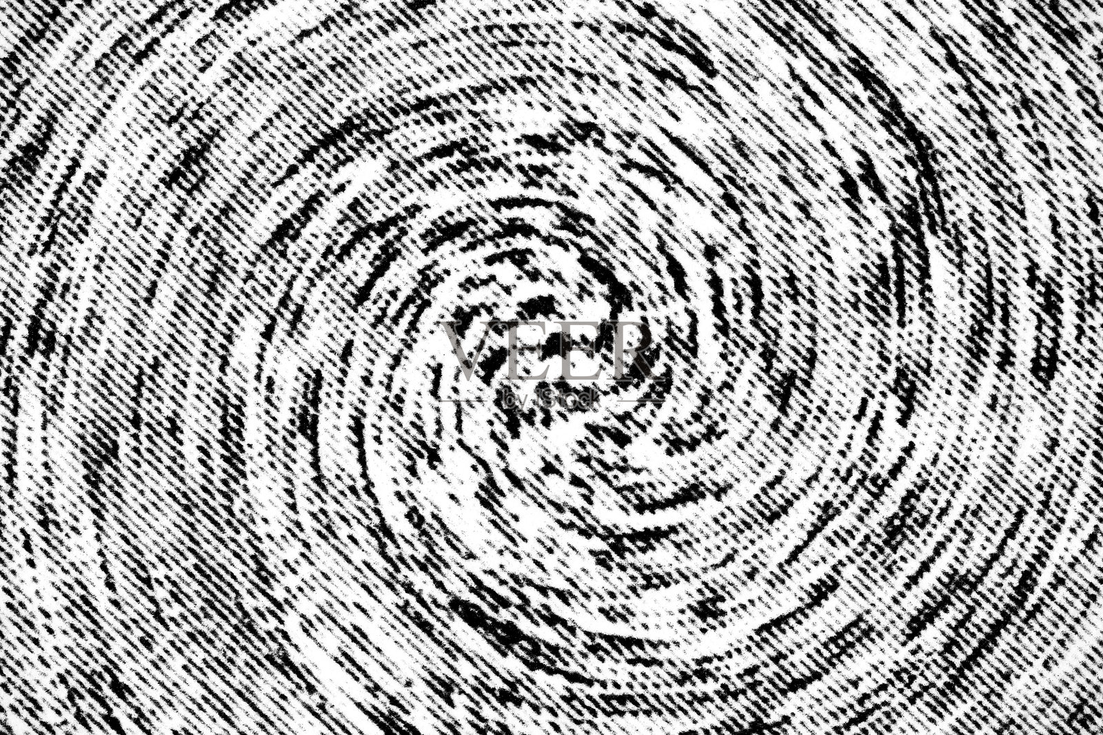 印刷纸上的扭曲螺旋网点图案的宏观视图照片摄影图片