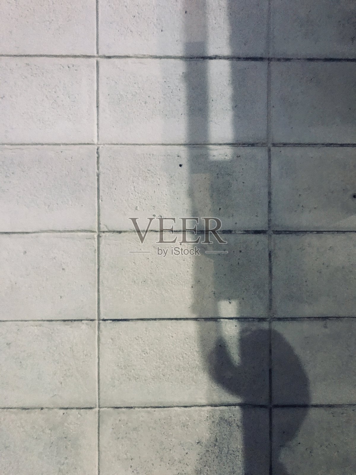 红砖墙上的阴影照片摄影图片