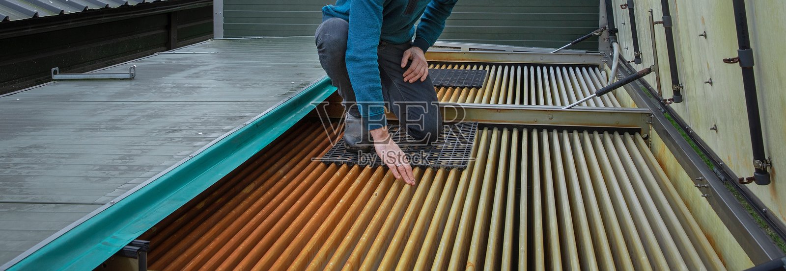 家禽养殖场的换热器。绿色能源照片摄影图片