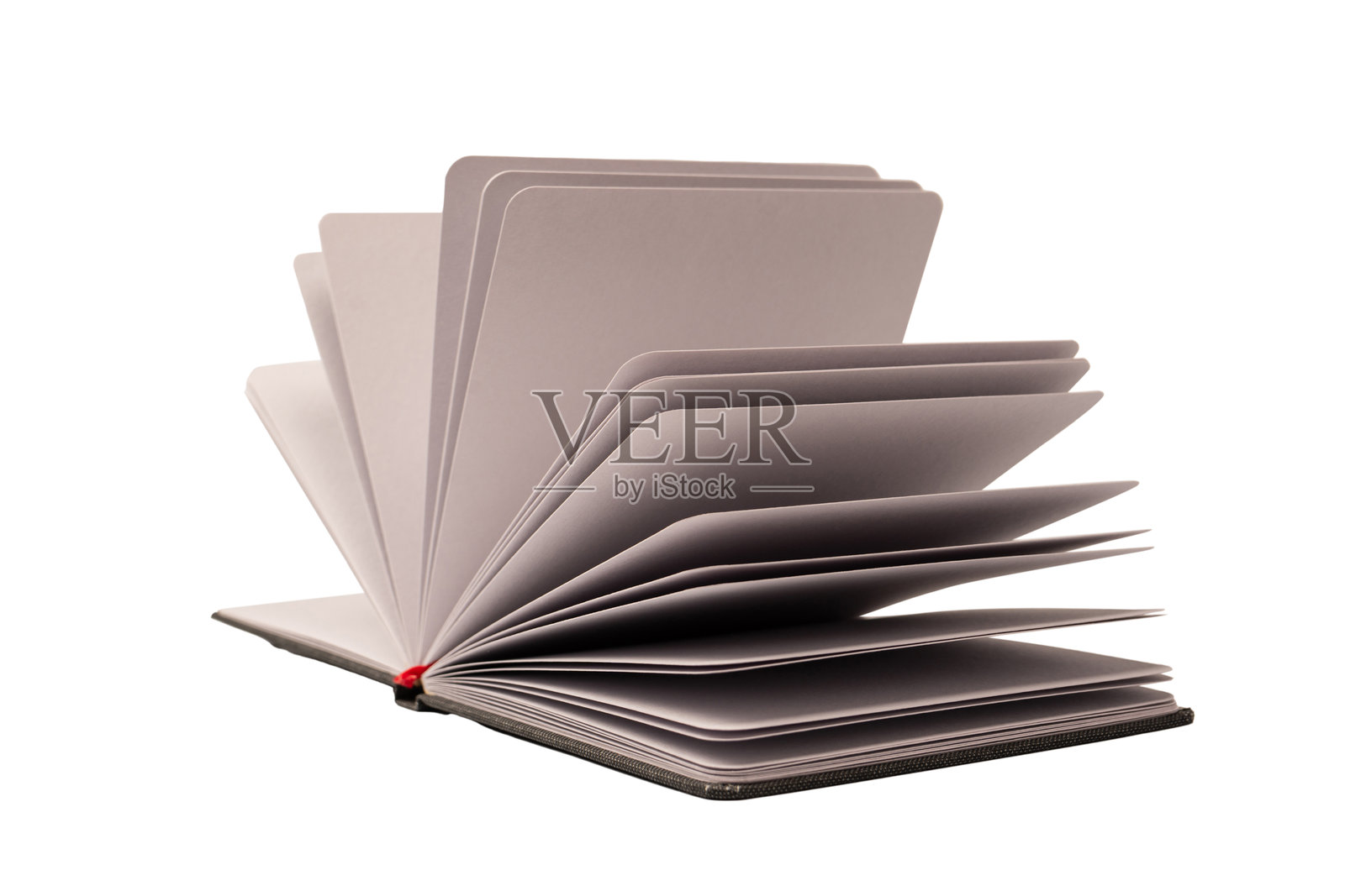 一张空白笔记本，孤立在白色背景上。照片摄影图片