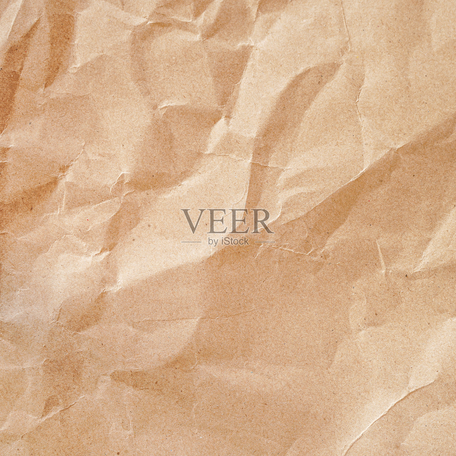 棕色起皱的可回收纸张纹理，可用作背景照片摄影图片