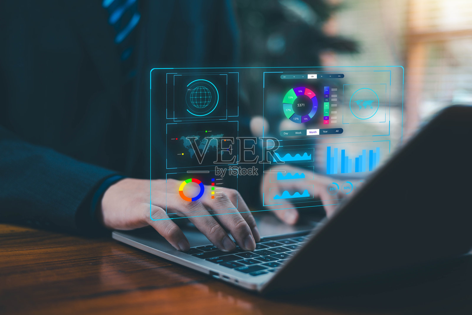 商界人士使用带有未来数据仪表板界面、分析图表、图形和数字技术元素的笔记本电脑，非常适合商业智能、大数据、金融科技和数字领域。照片摄影图片