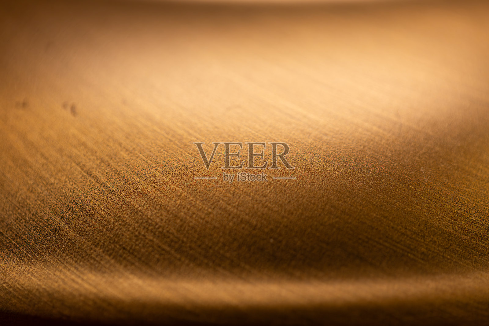 金色金属表面的细腻纹理特写照片摄影图片