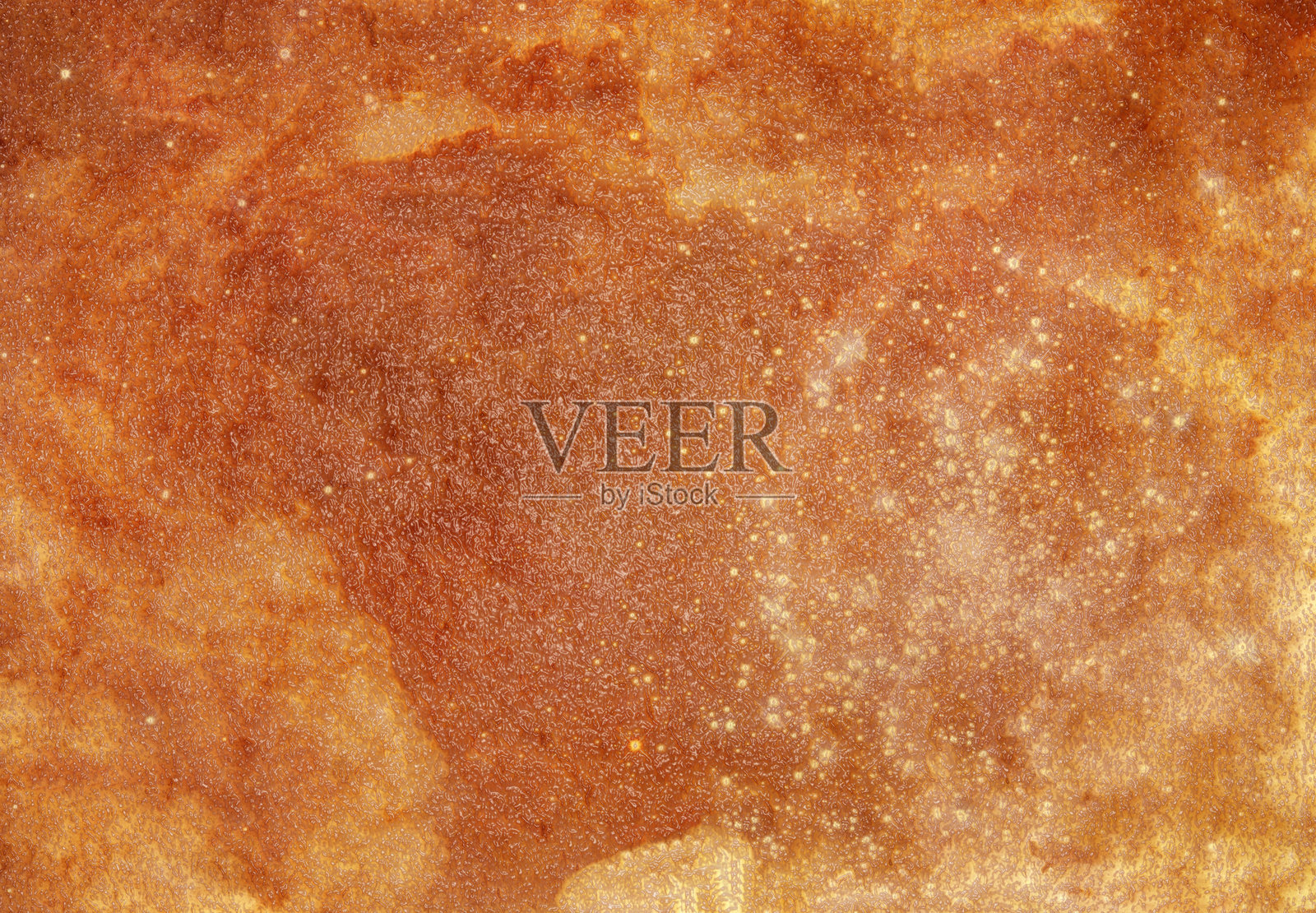 抽象的橙色和金色纹理背景，营造出闪闪发光的效果照片摄影图片