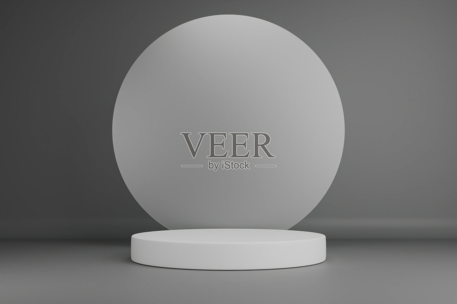 一个大球体被放置在一个底座上，背景是简单的灰色照片摄影图片