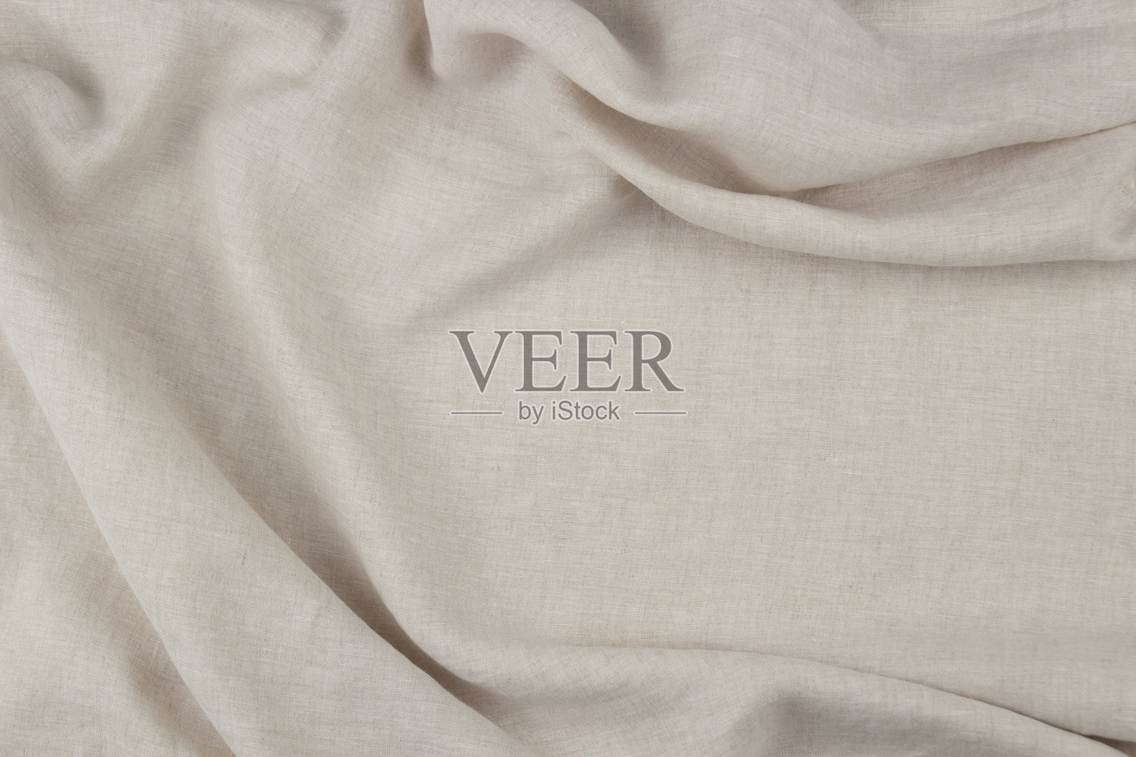 米色亚麻织物，带有柔和的褶皱，自然的生态纺织品纹理，适合极简背景照片摄影图片