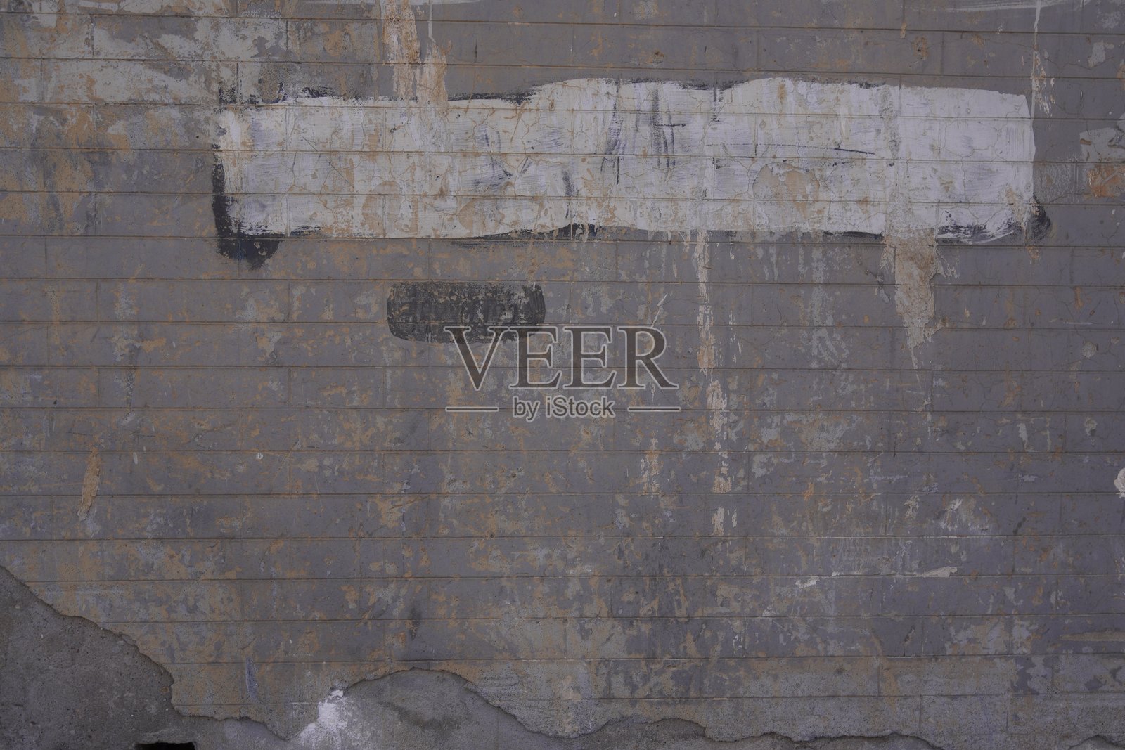 布满风霜的混凝土墙，带有褪色的油漆和纹理细节照片摄影图片