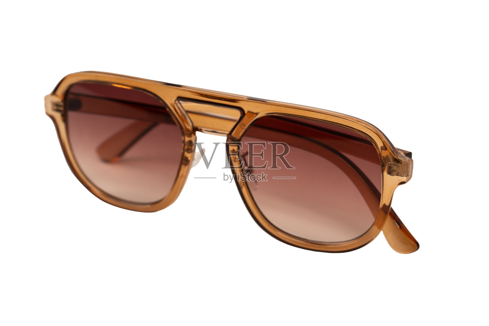 棕色时尚太阳镜女子，孤立在白色背景上。照片摄影图片