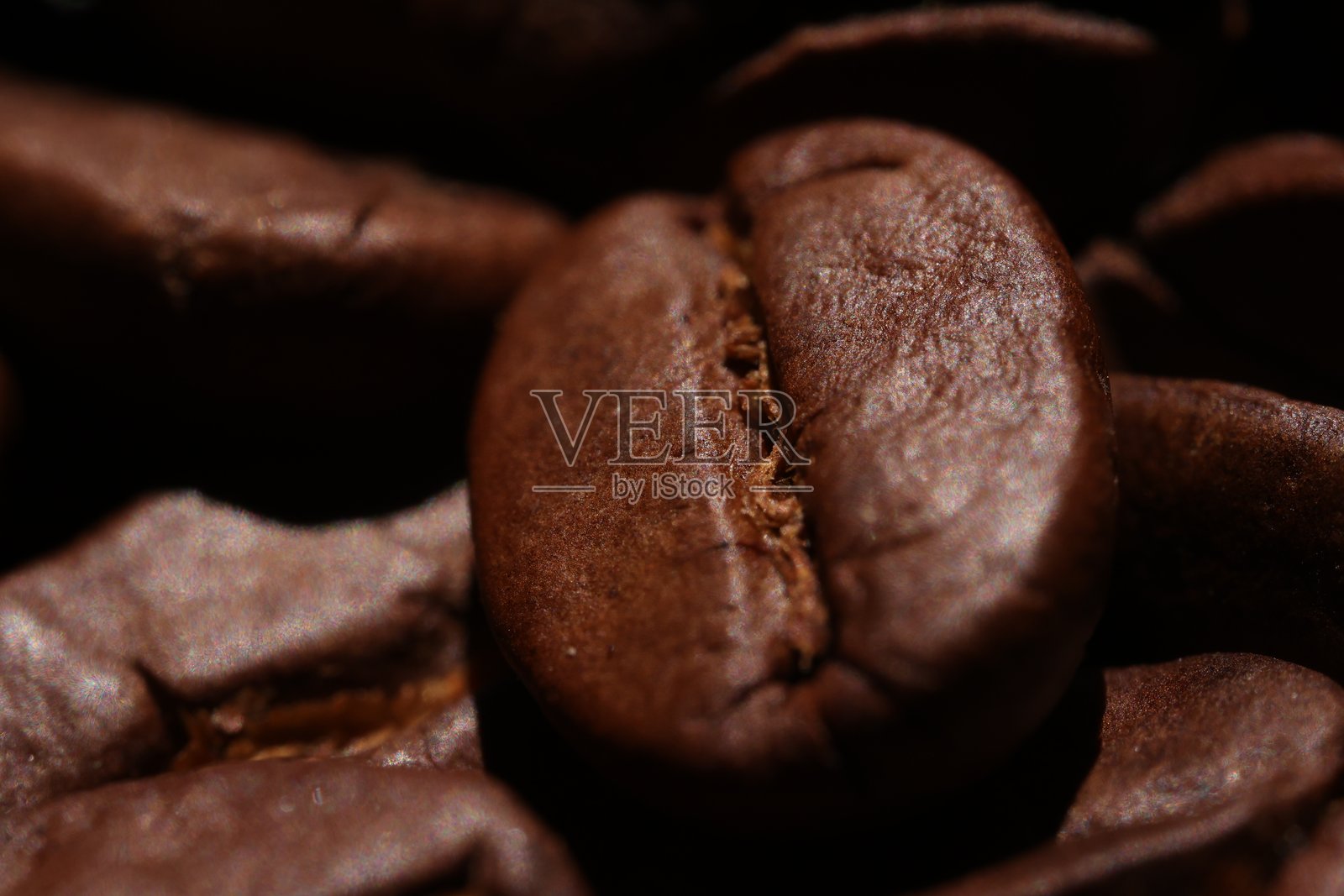 咖啡豆的宏观纹理，棕色咖啡豆的特写照片摄影图片