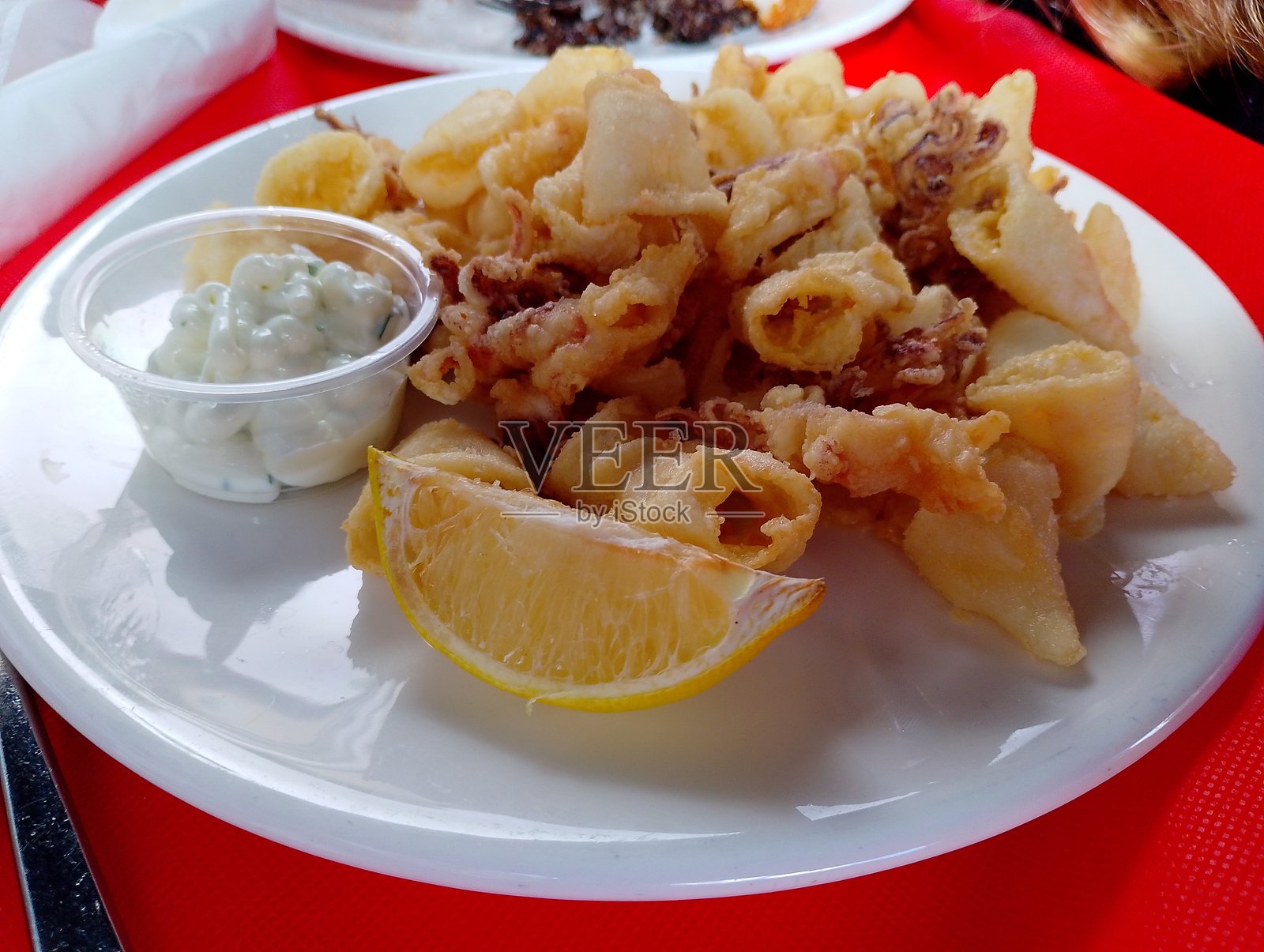 炸鱿鱼圈照片摄影图片