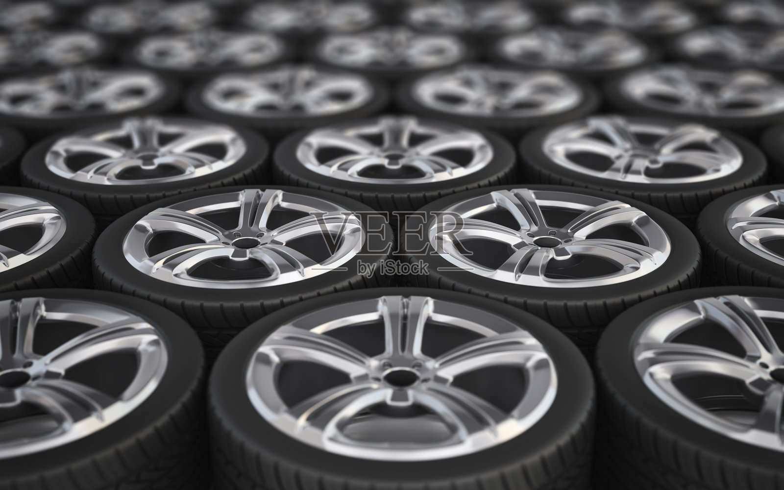 一排排带有合金轮毂的汽车轮子照片摄影图片