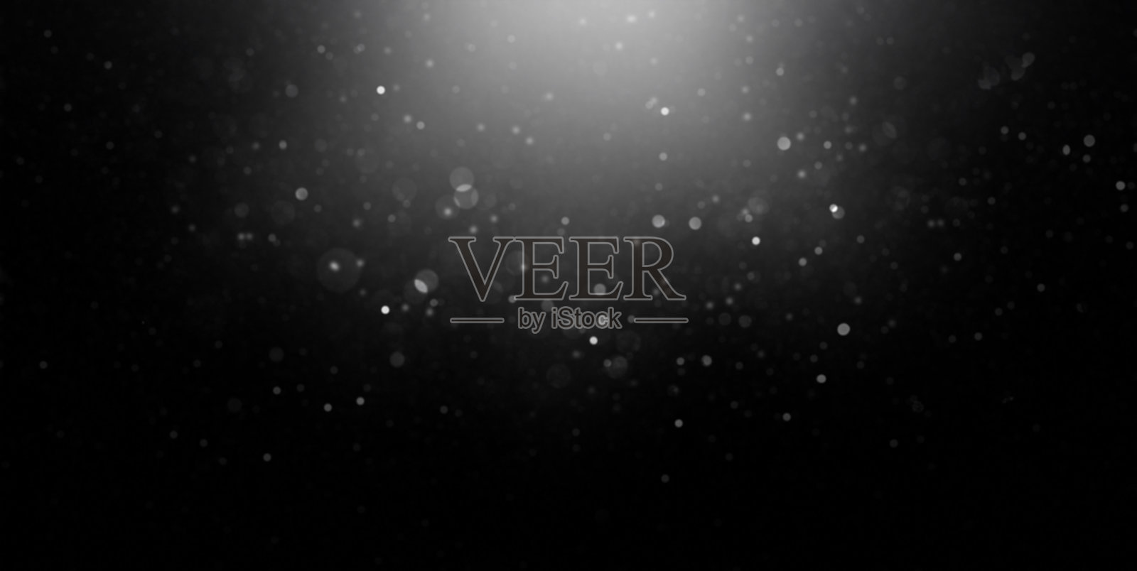 聚光灯下的黑暗尘埃粒子漂浮背景照片摄影图片