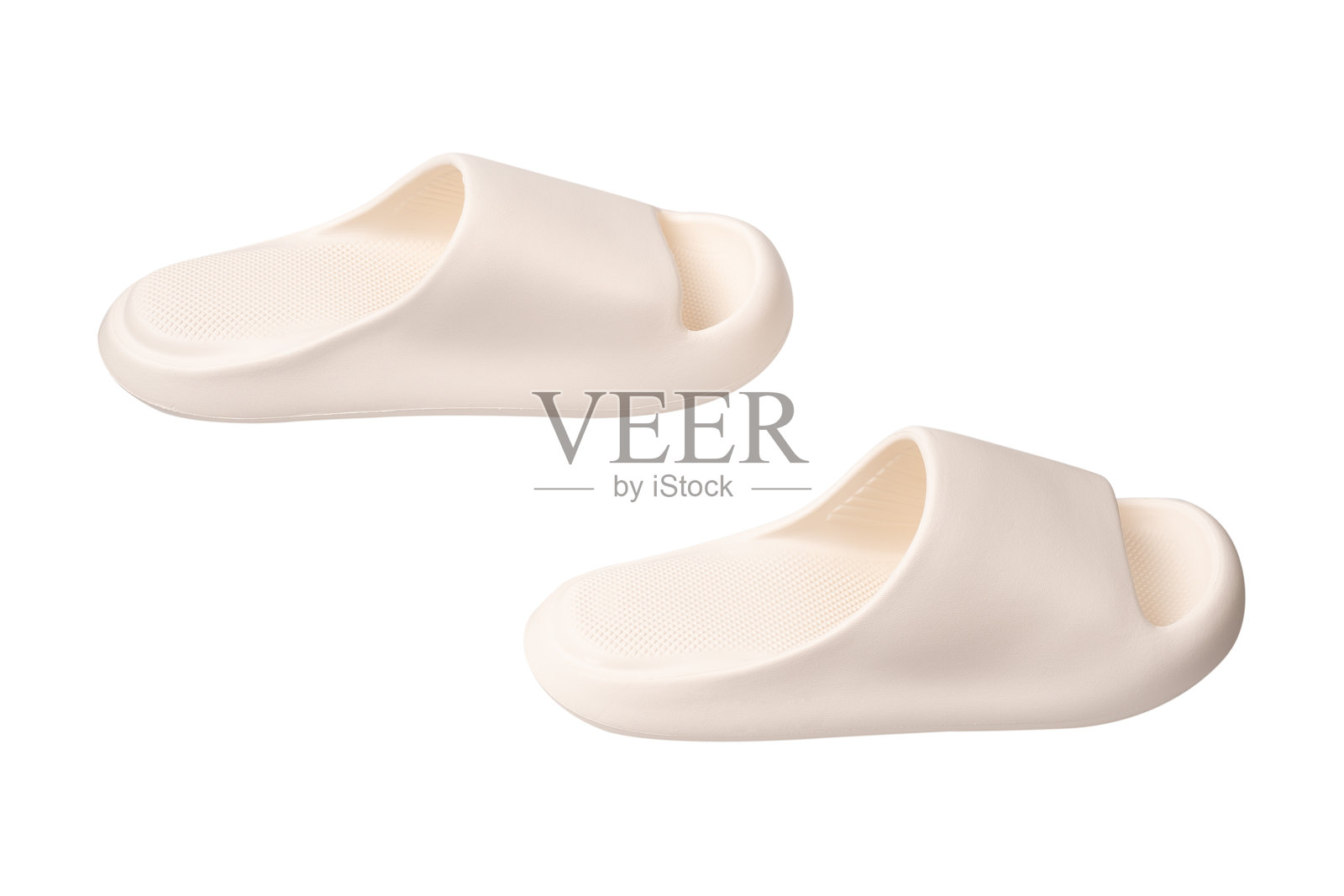 极简白色凉鞋，孤立在白色背景上。非常适合与夏季时尚、旅行、休闲、极简风格和电子商务产品相关的概念。照片摄影图片