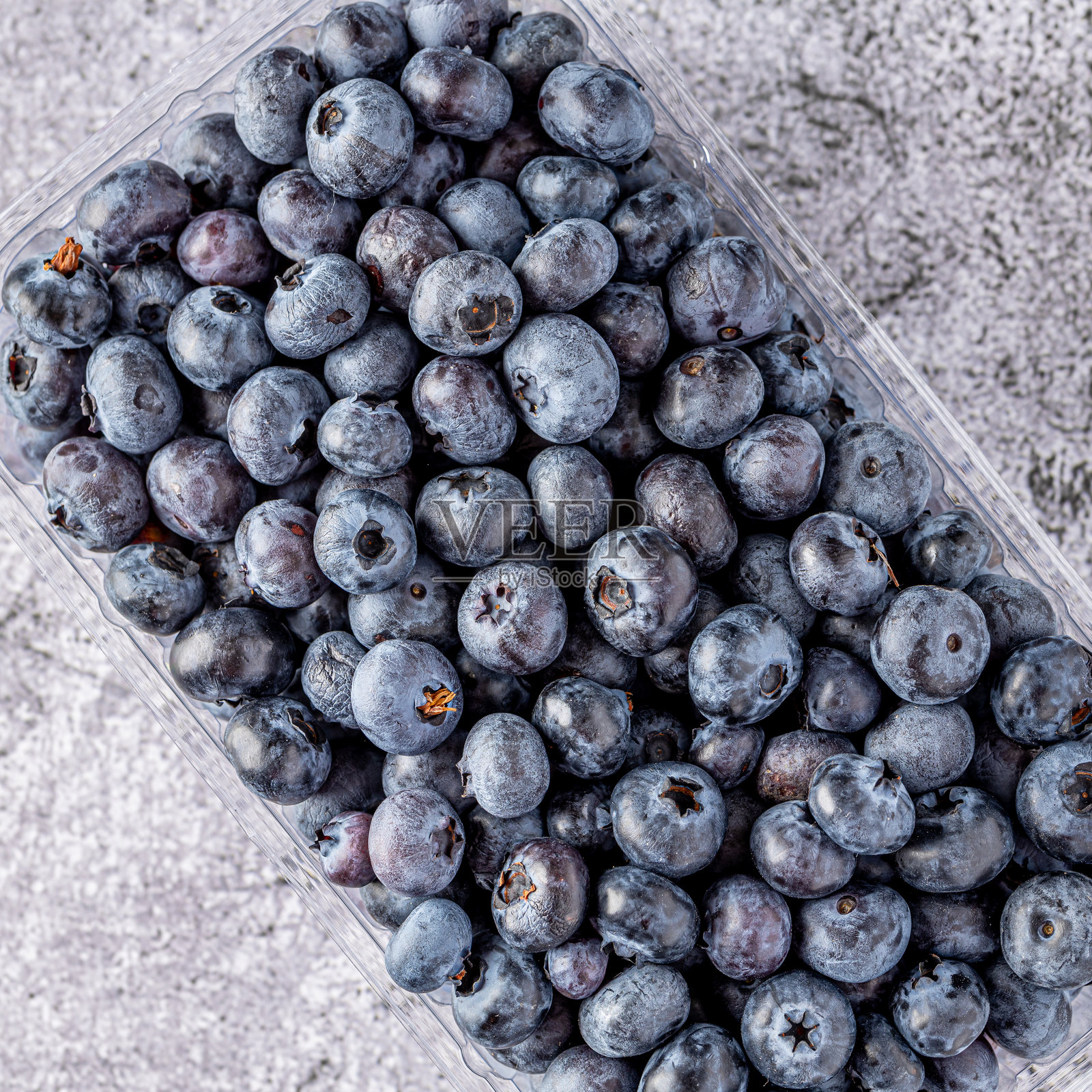 新鲜蓝莓背景。蓝莓纹理特写。蓝莓抗氧化有机超级食物碗概念。健康营养。照片摄影图片