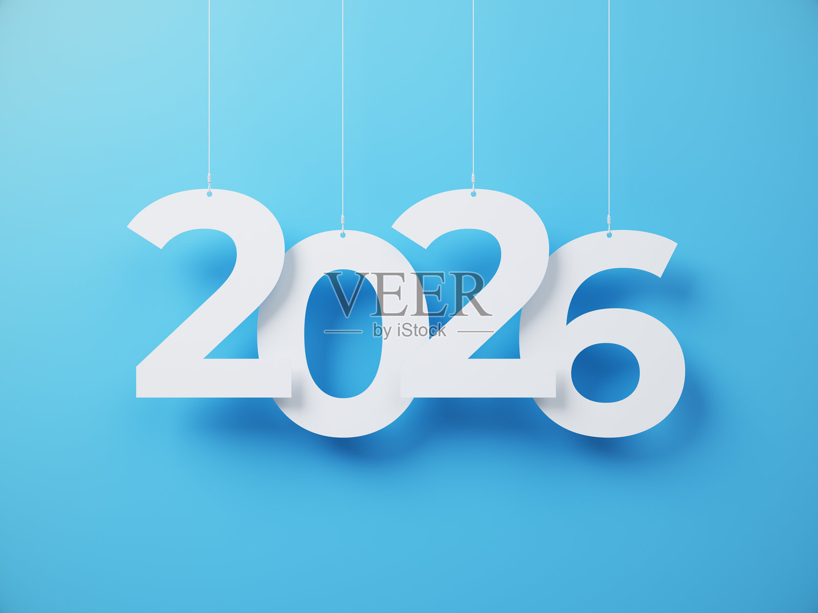 2026字样剪裁在悬挂在绳子上的白纸上照片摄影图片