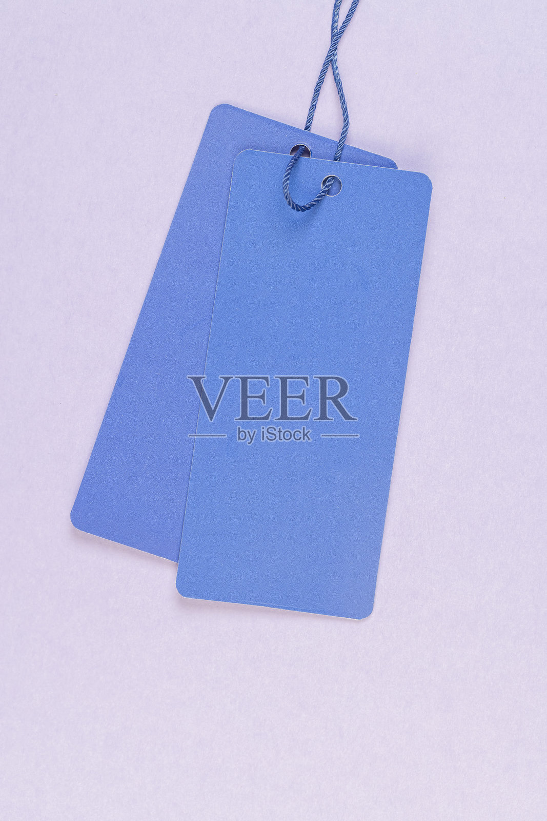 用于指示价格和其他信息的标签，一个未填写的旧服装标签，包含对顾客重要的信息照片摄影图片