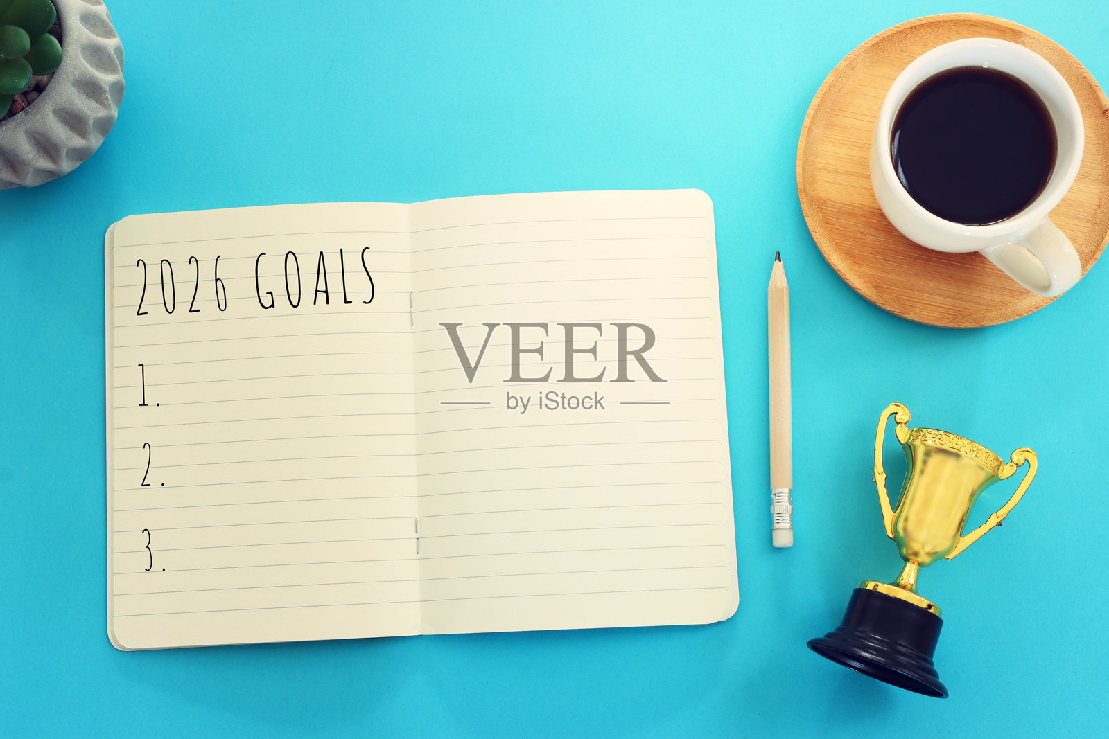 笔记本的俯视图，上面写着“2026年目标”照片摄影图片