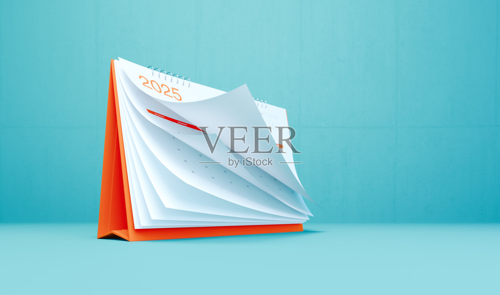 2025年的台历，背景为蓝色照片摄影图片