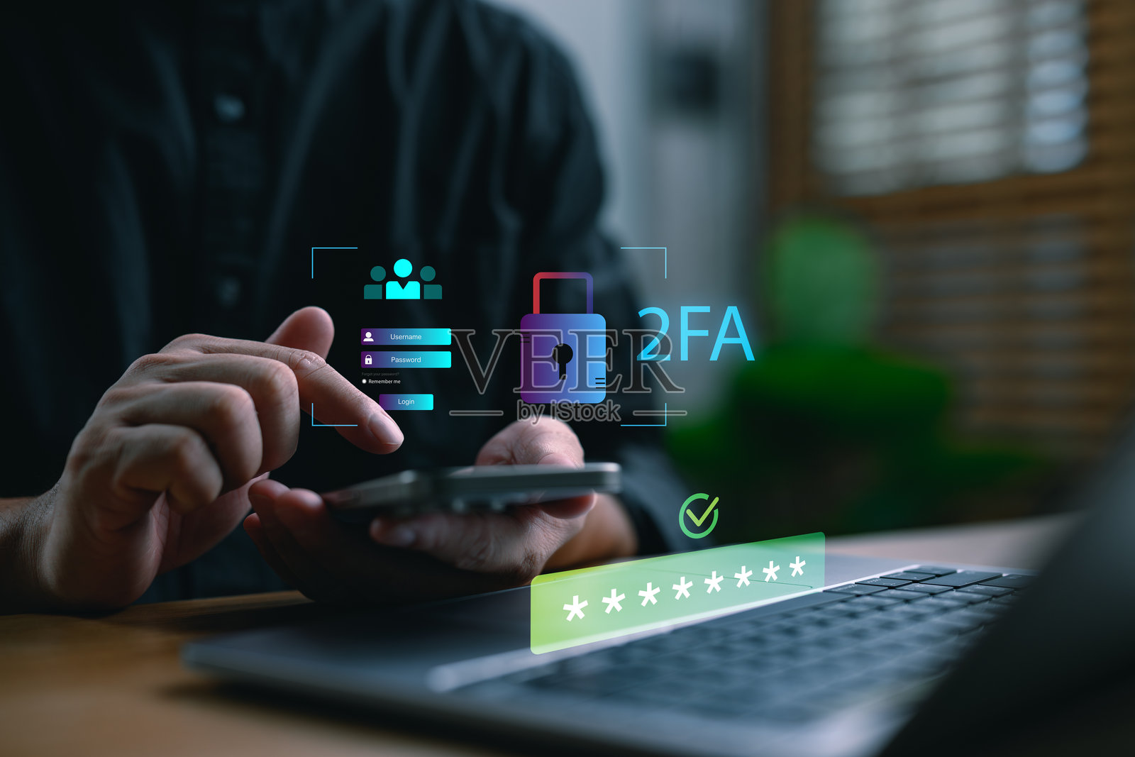 特写照片，展示手机上的双重身份验证安全，以及一台显示密码输入掩码的笔记本电脑。照片摄影图片