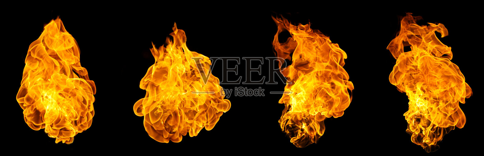 孤立的火焰在黑色背景上，展示出明亮的橙色形状和强烈的热量运动。适用于能源主题、爆炸概念、视觉效果和创意设计项目。照片摄影图片