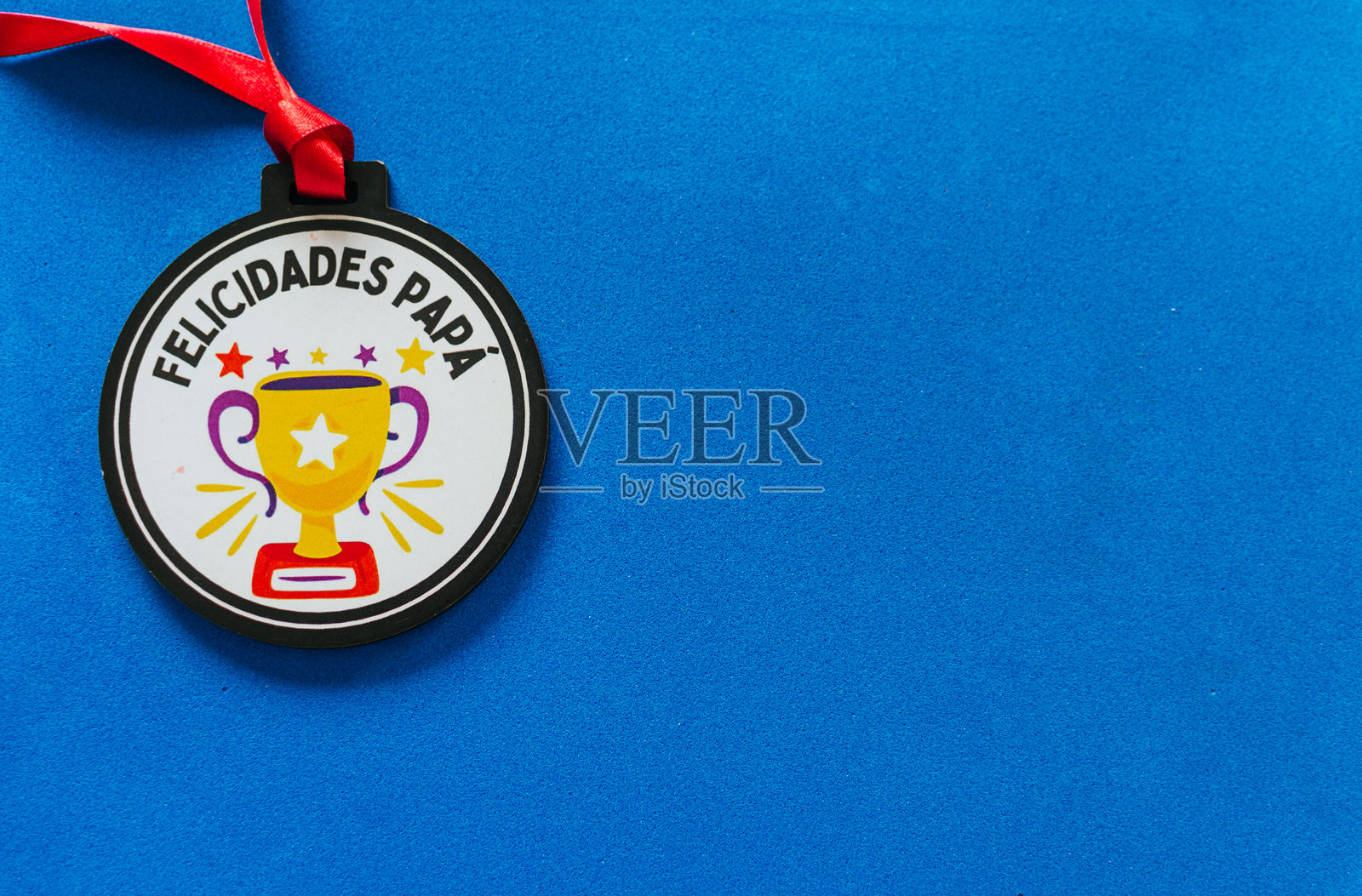 父亲节奖牌，上面刻有‘Felicidades Papa’字样照片摄影图片