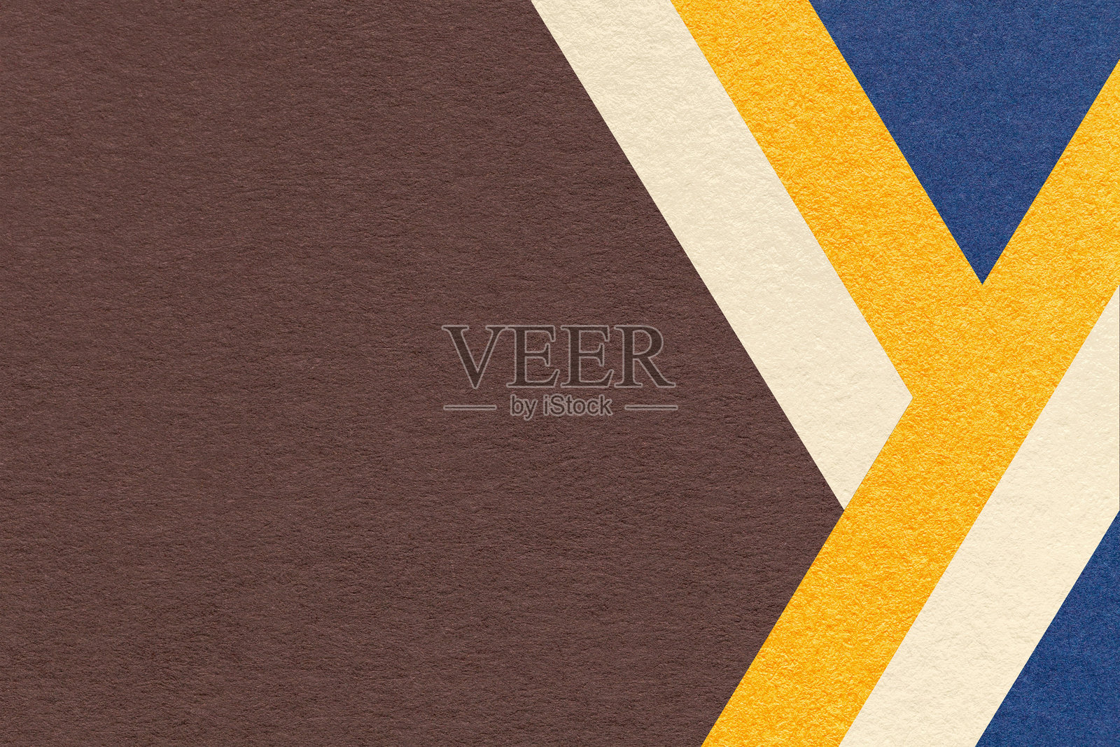 抽象的深棕色纹理纸背景，带有米色、黄色、蓝色几何线条，横幅展示的复制空间照片摄影图片