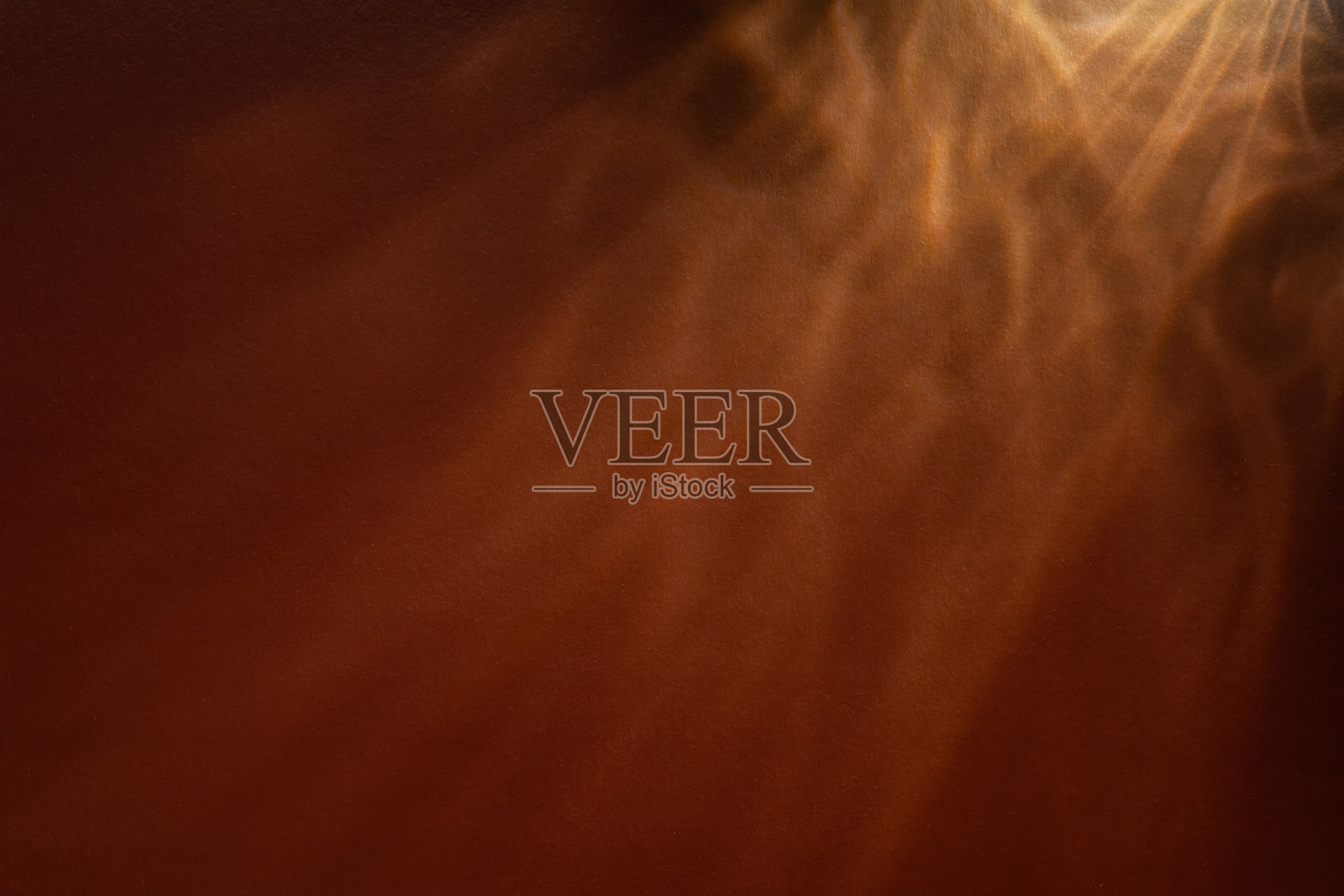 纸张抽象。彩色纸板上的光影游戏。棕色纸板照片摄影图片