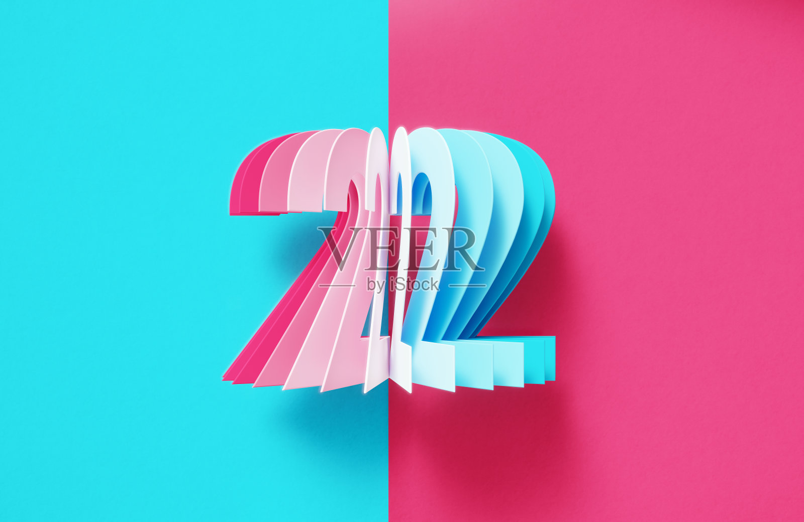 蓝粉背景上的彩色数字2照片摄影图片