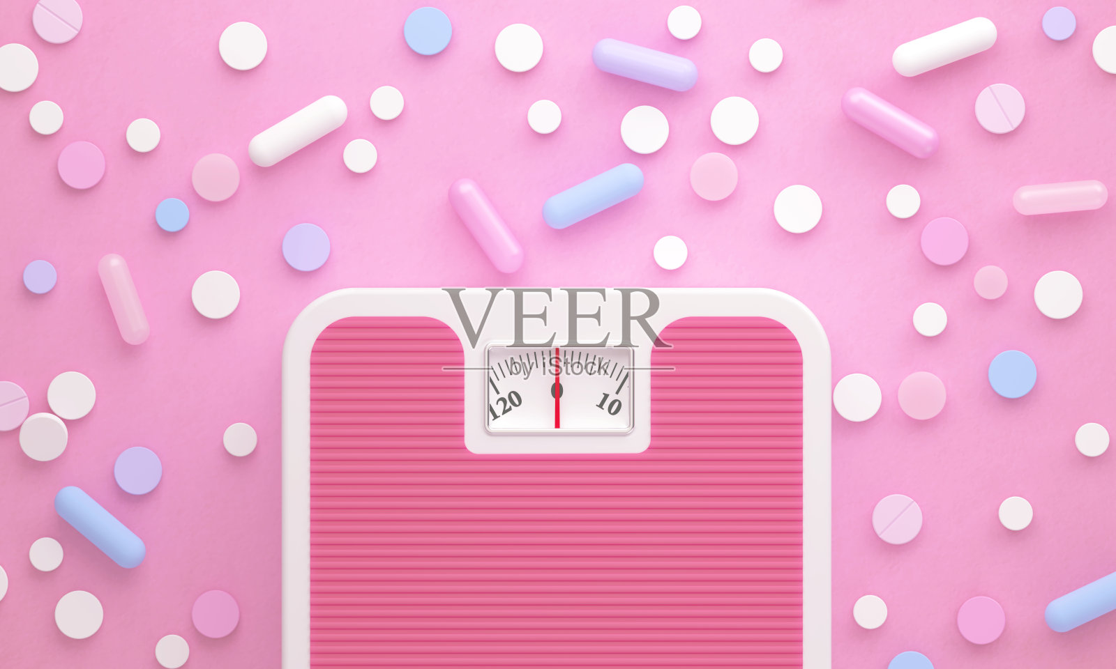 粉色体重秤和减肥药，背景为粉色照片摄影图片