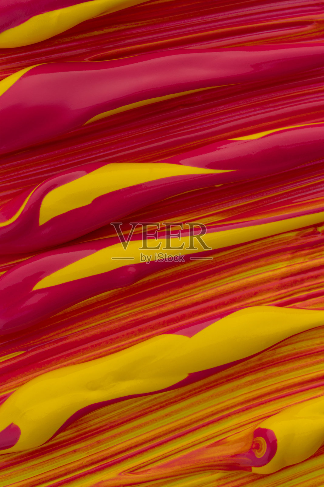 黄色和粉色丙烯颜料的宏观纹理照片摄影图片