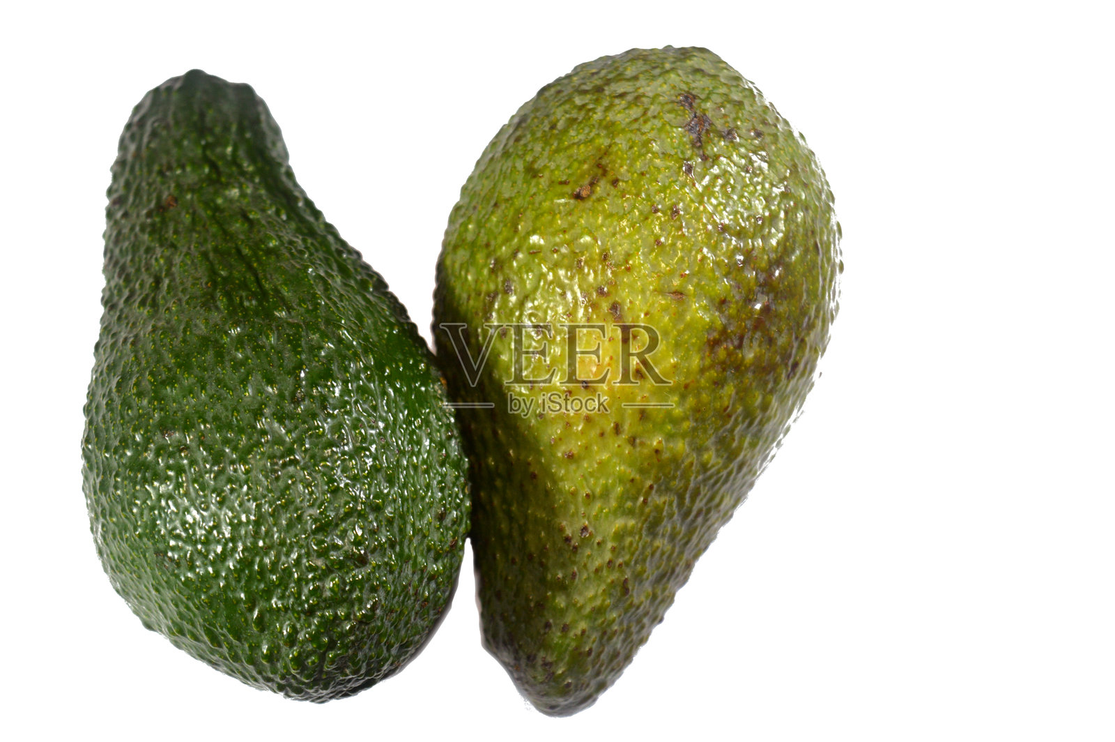 牛油果，一种营养丰富的果实，在植物学上属于大型浆果，以其奶油般的质地和健康的脂肪而闻名照片摄影图片