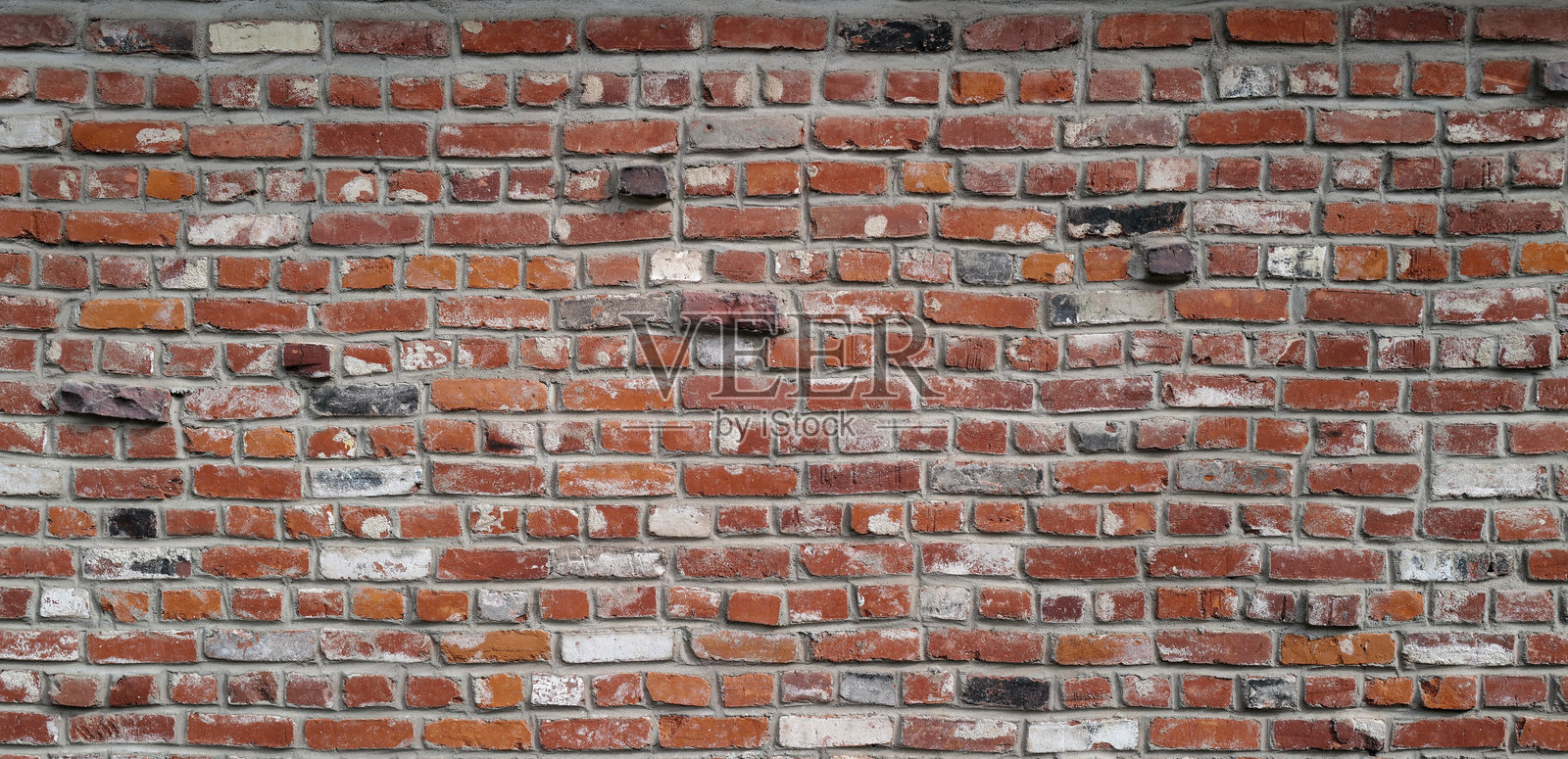 橙色砖墙纹理背景。砖砌表面图案背景。极简砖块背景。砖砌结构设计背景。照片摄影图片