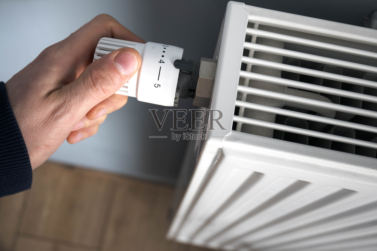 散热器恒温器和温度调节旋钮照片摄影图片