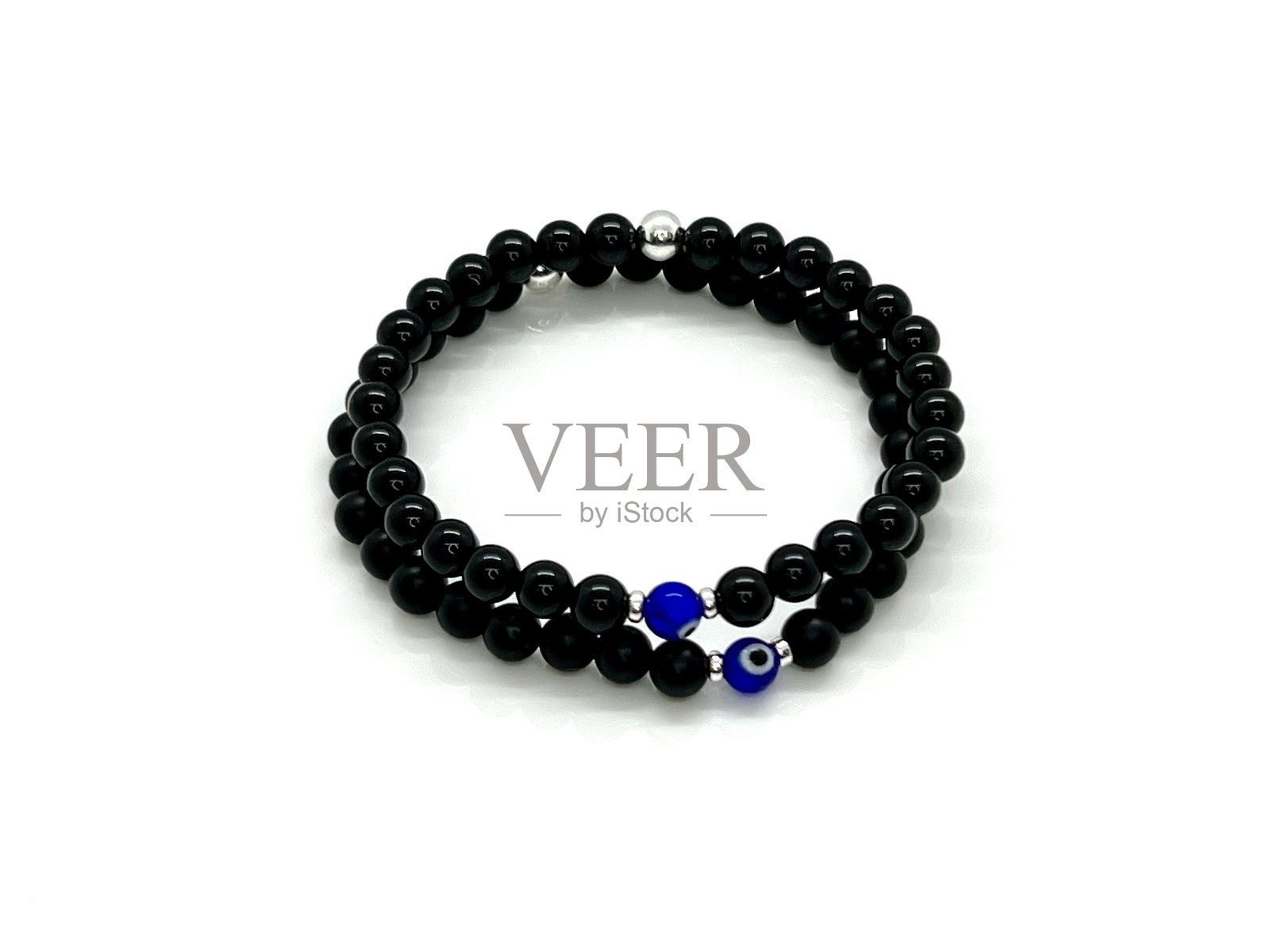 邪恶之眼与黑玛瑙串珠手链叠戴照片摄影图片