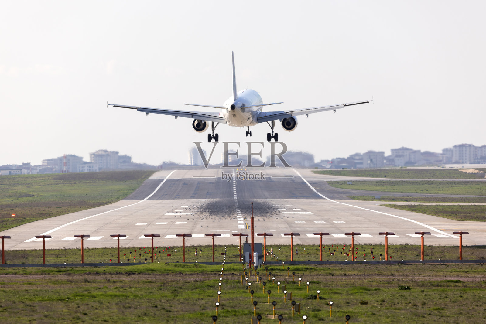 客机降落照片摄影图片