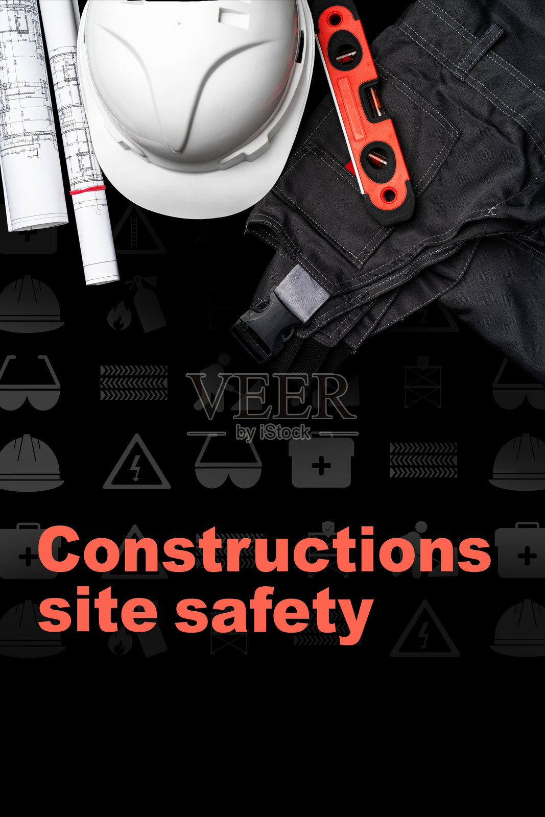 建筑工人在白天使用安全装备和工具在工地上完成工作照片摄影图片