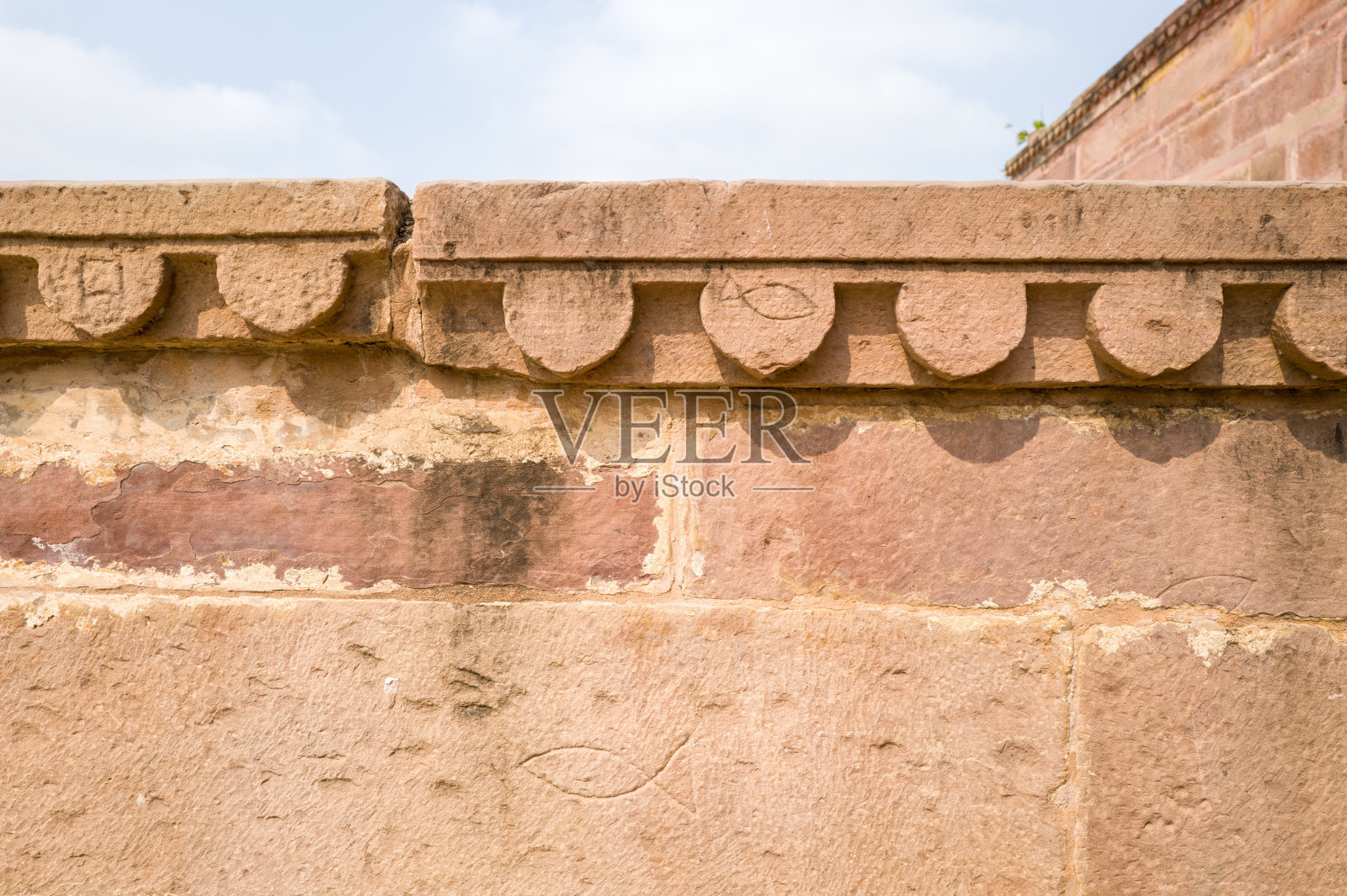 精美的砂岩墙细节，位于普拉亚格拉吉的胡斯罗花园照片摄影图片