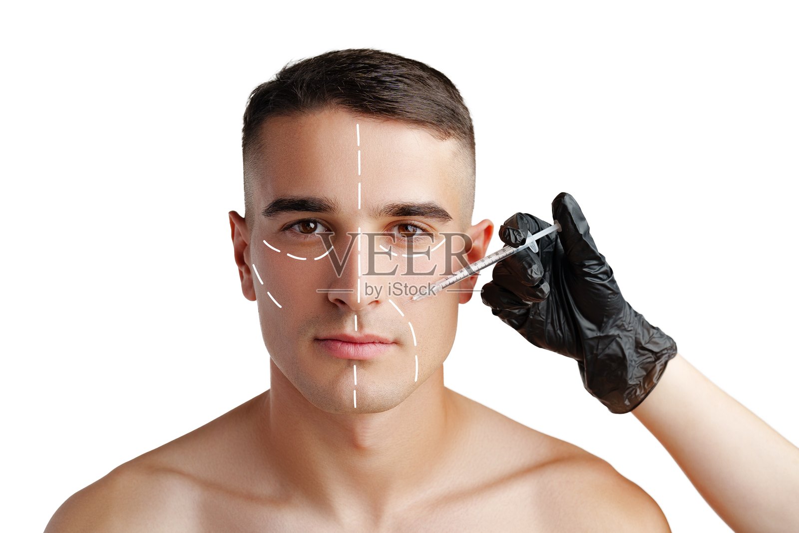 一名男子在临床环境中接受面部标记的美容治疗照片摄影图片