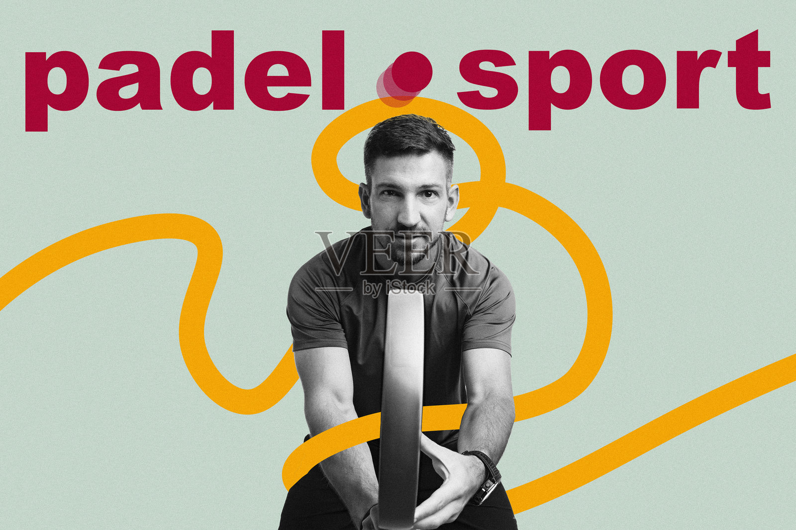 一名板式网球运动员手持球拍，表情专注地准备比赛照片摄影图片