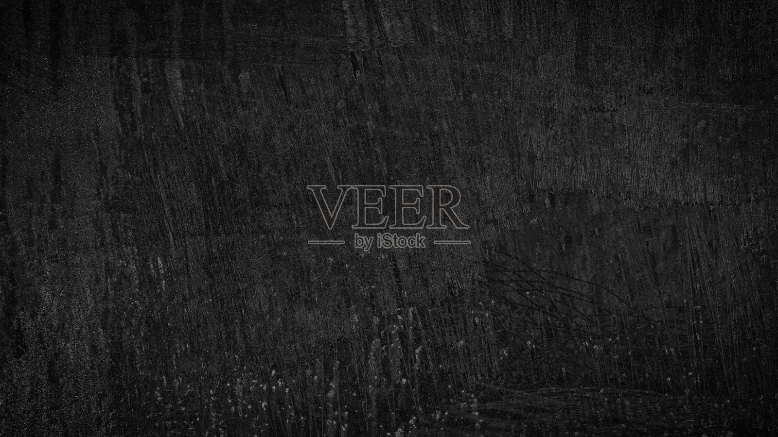 黑色金属锈蚀背景。金属锈蚀纹理。侵蚀金属。户外锈蚀金属墙上的划痕和污垢纹理。照片摄影图片