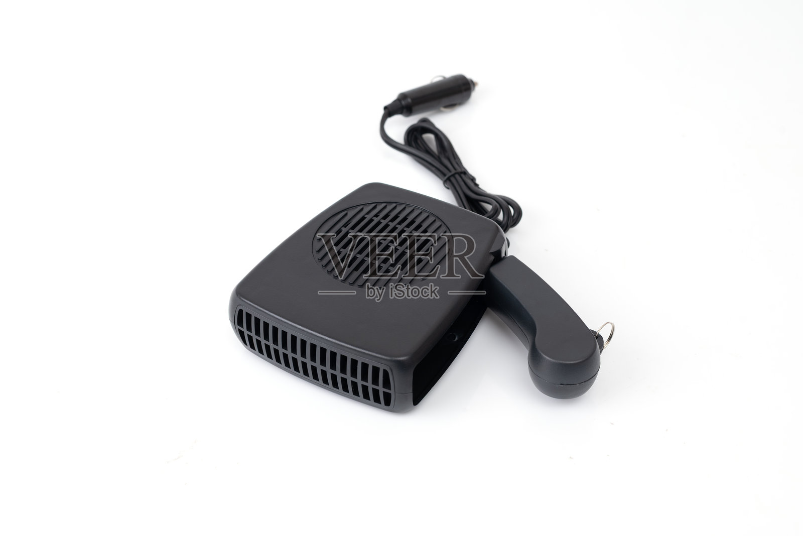 车载紧凑型黑色加热器，由点烟器供电，孤立在白色背景上，便携式汽车加热和除霜设备。照片摄影图片