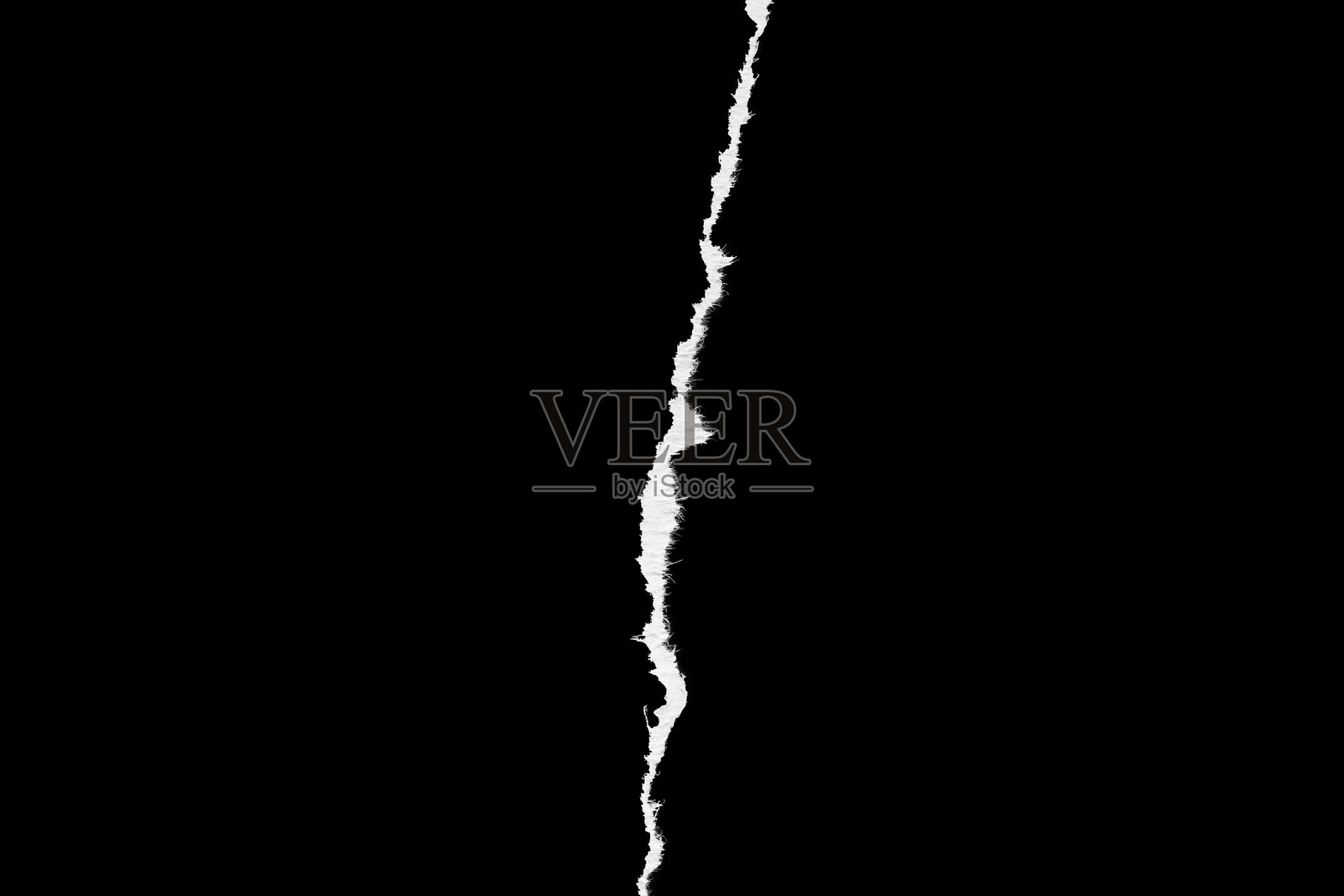 撕裂的纸张边缘，黑色背景照片摄影图片