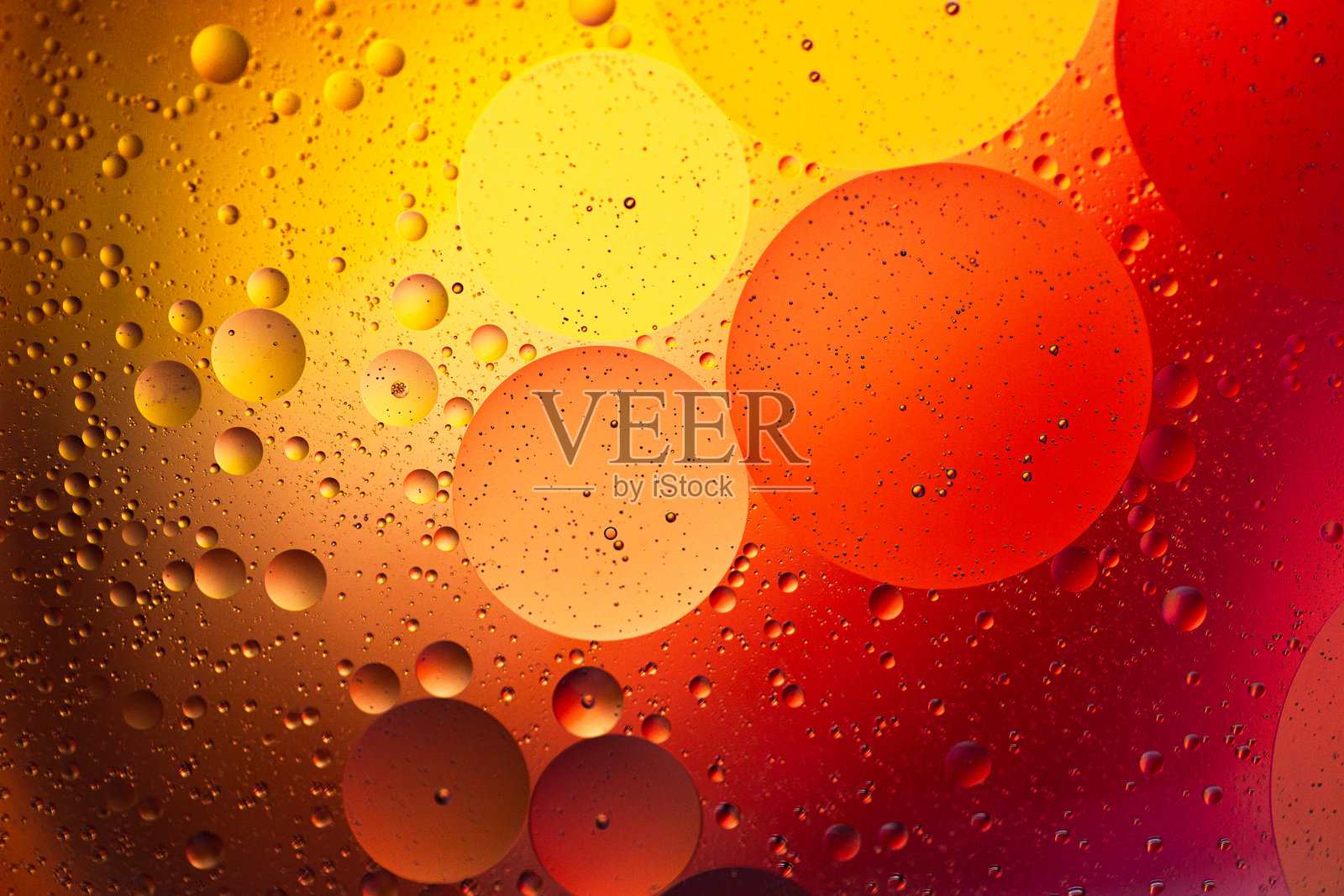 宏观油水红黄抽象背景照片摄影图片