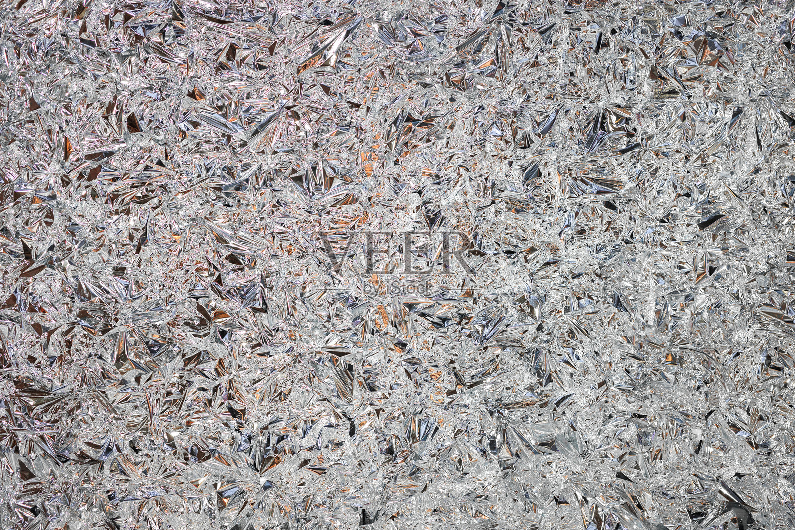 压制箔或银色聚酯纤维的纹理特写照片摄影图片