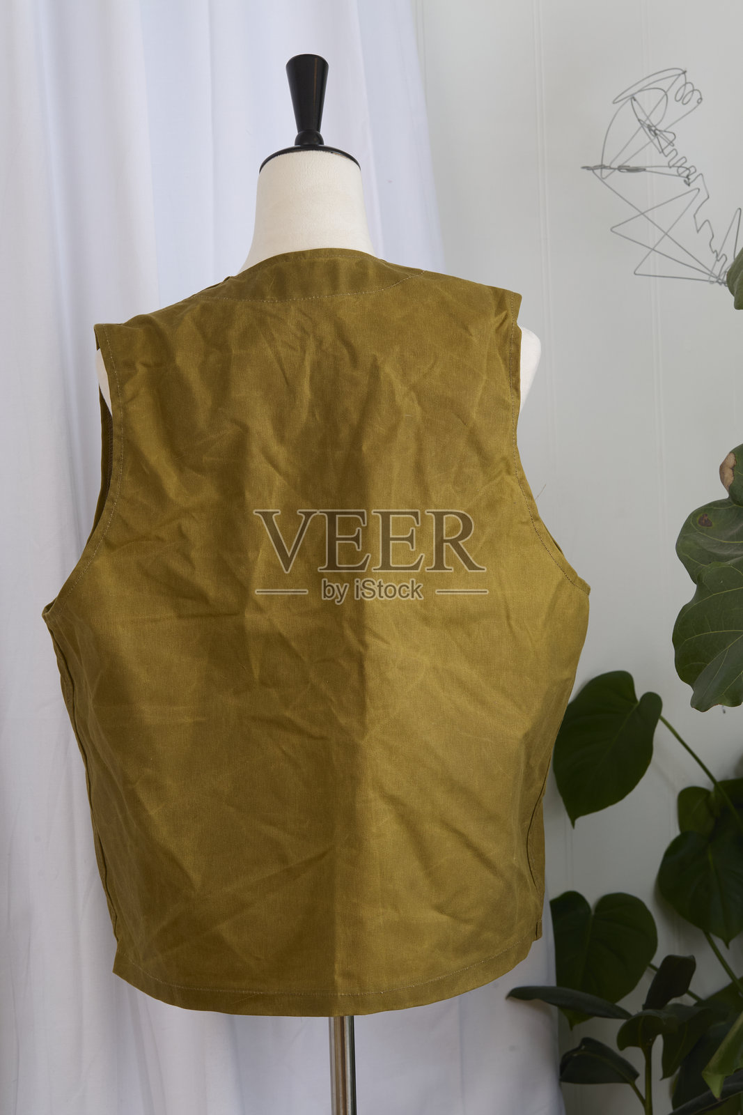 蜡质马甲展示在假人模特上照片摄影图片