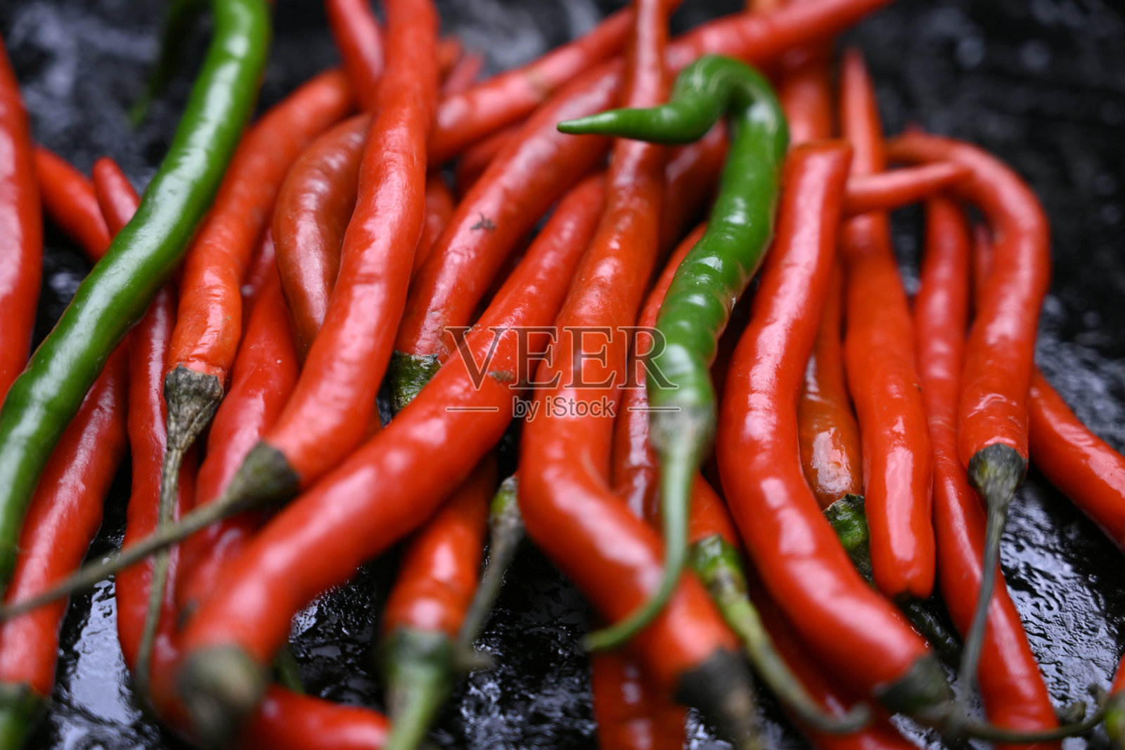 新鲜有机红辣椒，辛辣，充满活力的食物纹理背景照片摄影图片