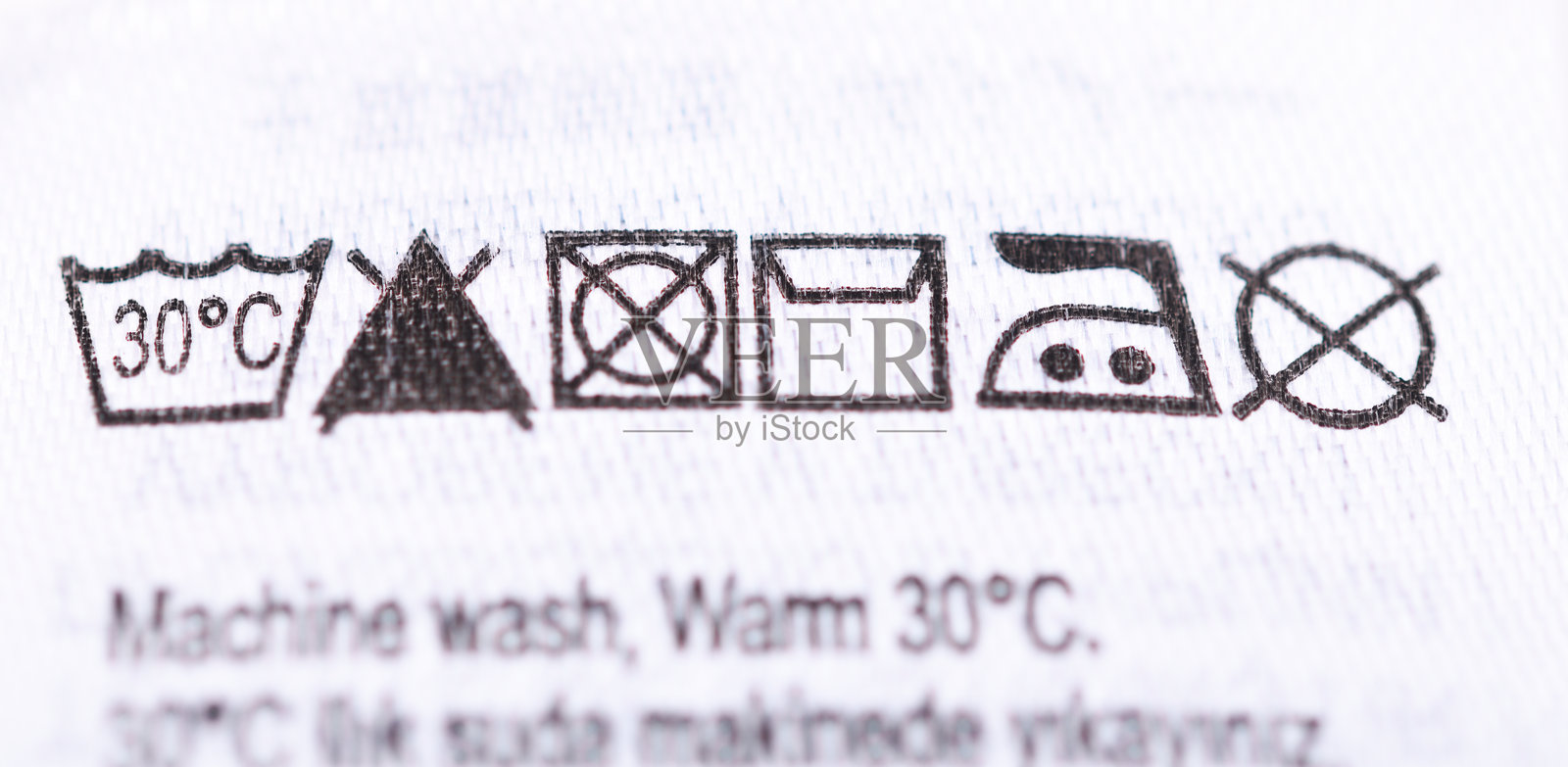 织物服装洗涤标签特写照片摄影图片