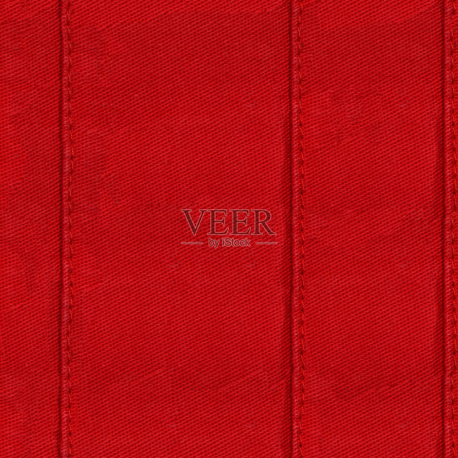 无缝红色牛仔布料带接缝，牛仔夹克，牛仔裤，可用作背景或布料样品销售。照片摄影图片